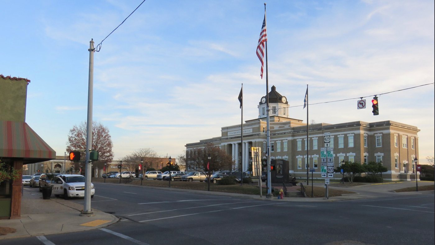 The Morehouse Parish Courthouse with its clock tower, seen across Courthouse Square in downtown Bastrop